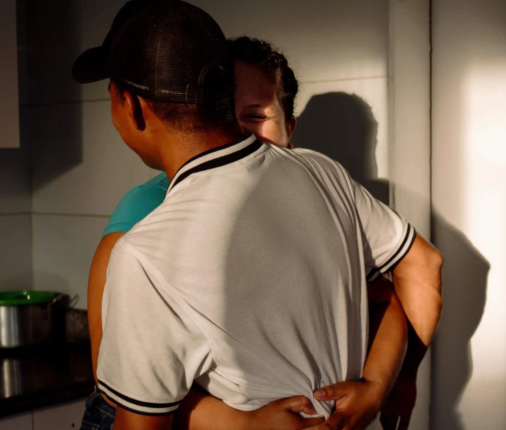 23_HuggingInKitchen